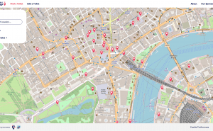 The homepage of the The Great British Public Toilet Map homepage showing a map of london with toilets marked in red.