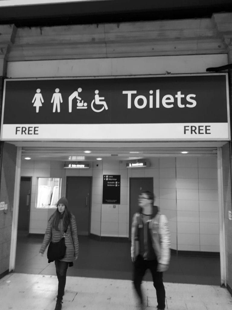 High level Toilet Sign in British Rail Station, toilets marked FREE (no payment)
